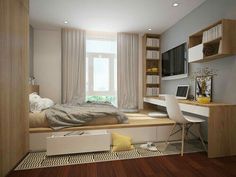 a bedroom with a bed, desk and computer