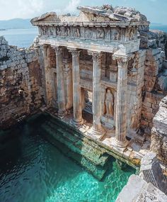 an old building that is built into the water