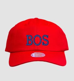 a red hat with the word bos on it in blue letters and a white background