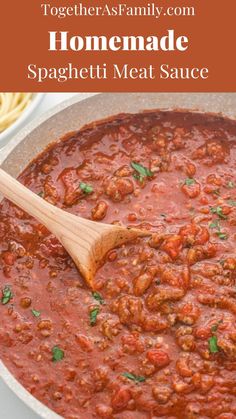 a skillet filled with spaghetti sauce and topped with fresh parsley on the side