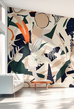 a living room with an abstract wallpaper design