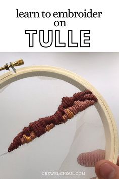 someone is stitching an embroidery pattern on a hoop with the words learn to embroider