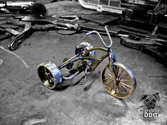 an old bike is sitting on the ground