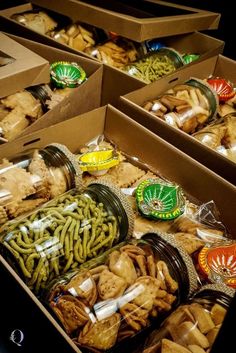 several boxes filled with different types of food and snacks in each one's box