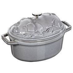 an elephant covered casserole is shown on a white background with the lid open