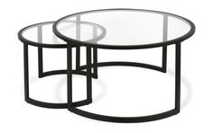 two tables with glass tops on each side and black metal frame around the table top