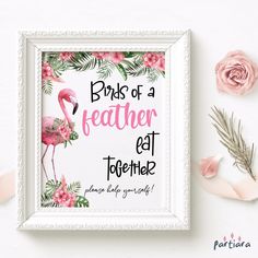 a pink flamingo print on a white frame next to flowers and greenery with the words, bras of a featherer eat together