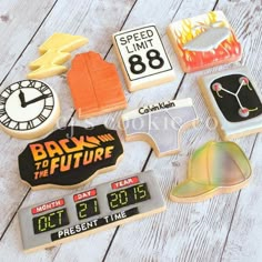 some cookies that are on top of a wooden table with the words back to the future