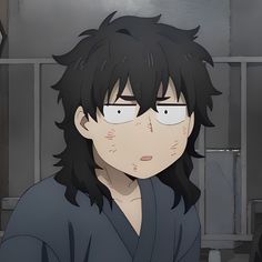 an anime character with black hair and white eyes staring at something in front of him