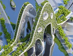 an aerial view of a futuristic building surrounded by trees