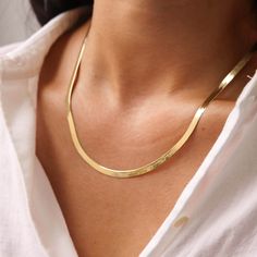 14K Gold Herringbone Chain Necklace, Gold Snake Chain Necklace, Layering Necklace D E T A I L S * Gold KT: 14K Solid Gold * Gold Color: Yellow Gold * Chain Lengths: 6.5", 7", 7.5", 14", 16", 18", 20", 22", 24" * Chain Width: 2mm, 3mm, 4mm * Chain Style: Herringbone  * Closure: Lobster S H I P P I N G & R E T U R N S * Ready to Ship in 1-2 Business Days * FREE shipping on all U.S. orders  * This item is final sale. * Packed in labeled gift box C O N T A C T Contact us with any inquiries by Etsy c Gold Herringbone Chain, Boho Butterfly, Gold Snake Chain, Dainty Choker, Yellow Jade, Herringbone Chain, Snake Chain Necklace, Jade Necklace, African Style