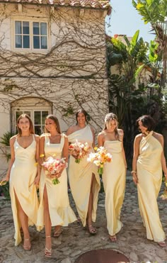 the bridesmaids are all dressed in yellow dresses