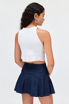 Kimchi Blue mini skirt in a prep-inspired pleated style. Designed in a soft & stretchy denim featuring a mid-rise, v-shape drop waist and flared pleated skirt. Topped with a button fly for a vintage touch. Exclusively at Urban Outfitters. Features Kimchi Blue Annabeth drop waist denim mini skirt Pleated mini skirt Soft & stretchy denim Mid-rise denim waist with buttons and belt loops Drop v-waistline Flared knife-pleated skirt Drop waist a-line fit Mini length Button closure UO exclusive Content Mini Skirt Pleated, Knife Pleated Skirt, Blue Mini Skirt, Skirt Pleated, Kimchi Blue, Pleated Midi Skirt, Pleated Mini Skirt, Denim Mini, Denim Mini Skirt