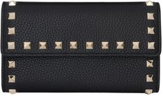 Grained calfskin continental wallet in black. · Pyramid studs and burnished edges throughout · Logo stamp at back face · Press-stud flap · Zip pocket and two note slots · Seven card slots · Moiré lining · H4 x W7 x D1 Supplier color: Black Black Pyramid, Valentino Black, Logo Stamp, Press Studs, Handbag Accessories, Pyramid, Valentino Garavani, Wallet Case, Continental Wallet