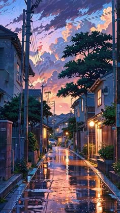 an image of a city street at night with rain on the ground and buildings in the background