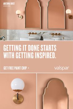 a bathroom with pink walls and gold fixtures