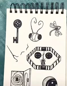 a notebook with some drawings on it