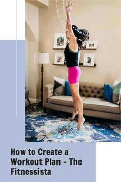 a woman in pink shorts and black shirt doing a handstand on the floor