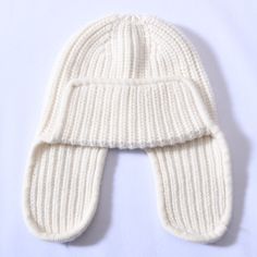 For fashion enthusiasts out there, this beanie is a must-have. Its comfort factor, complete with earflaps, makes it a preferred choice among people. Women particularly love this comfortable beanie for its warmth and coziness. Crafted from high-quality cashmere and wool, it offers both comfort and style. Don't miss out on this trendy beanie!SpecificationsStyle: CasualPlace Of Origin: China (Mainland)Pattern Type: SolidOrigin: Mainland ChinaModel Number: JX-016Material: WoolItem Type: Skullies & BeaniesGender: WOMENFeature: Keep warmDepartment Name: AdultCN: ZhejiangBrand Name: GeraldBlackApplicable Season: WinterApplicable Scene: Casual ShippingThis product ships from China in 3 to 5 days. You should receive this product within 12 to 21 business days. Our standard shipping is free to most c Cashmere Beanie, Warm Winter Hats, People Women, Winter Walk, Skull Design, Winter Hat, Winter Looks, Beanie Hat, Stylish Accessories