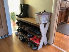 a shoe rack with several pairs of shoes on it