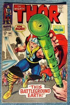 the cover to thor and his battleground earth