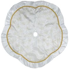 a white cloth with gold trimmings and a circle on the center is shown