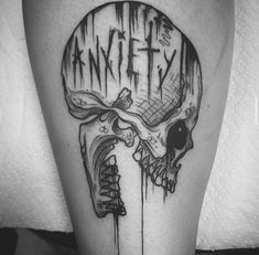 a black and white image of a skull with the word anarchy on it's side