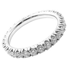 Platinum Diamond Étincelle De Cartier Eternity Band Ring by Cartier. With 29 round brilliant cut diamonds VVS1 clarity, E color total weight approximately 0.94ct Details: Size: European 51, US 5.75 Weight: 3.2 grams Width: 2.6mm Stamped Hallmarks: PT950 Cartier 51 CBZ321 Your Price: $8,500 T3018hmrd Cartier Silver Diamond Ring, Luxury Cartier White Gold Diamond Ring, Cartier Silver Rings Fine Jewelry, Elegant Cartier Rings In Diamond White, Cartier Silver, White Cartier Ring - Fine Jewelry, Cartier Diamond, Work Fits, Eternity Band Ring