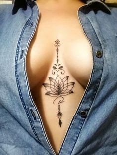 Be unique. Be different. Find a breast tattoo idea that reflects your personality. More than 50 unique and latest ideas are collected in our article. Underboob Tattoo Designs, Hidden Tattoos, Hand Tattoos For Girls, Tasteful Tattoos, Inspiration Tattoos, Chest Tattoos For Women, Tattoos For Black Skin