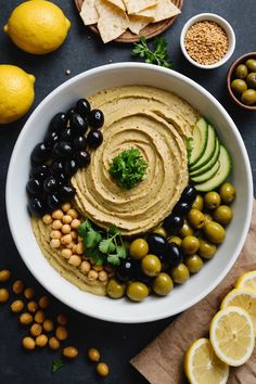 A photo of a  Olive Hummus which is a type of hummus bowl Healthy Hummus, Mediterranean Meals