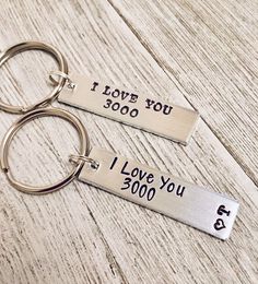 two keychains that say i love you, i love you and i love you