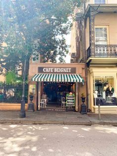 a cafe is on the corner of a street