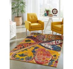 two yellow chairs sitting on top of a rug in a living room next to a window