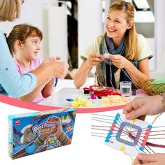 a group of people sitting around a table with candy sticks and other items in front of them