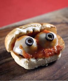 a hot dog with googly eyes on it