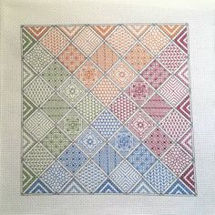 a cross stitch pattern with different colors on it