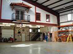 the inside of a large garage with lots of storage