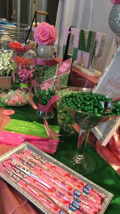 the table is set up with candy and candies