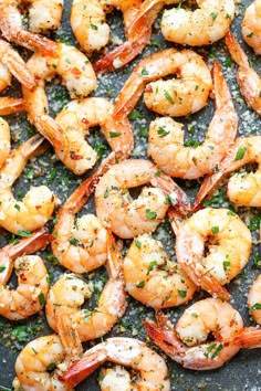 cooked shrimp with herbs and seasoning in a skillet, ready to be eaten