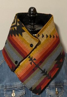 These cowls are made with Pendleton® fabric, black snaps and lined with Sherpa. Measurements are 7.5 inches by 32 inches. Pendleton Fabric, Perfect Gift Wrapping, Wool Cowl, Pendleton Wool, Fabric Black, Neck Warmer, Warm And Cozy, Scarf Wrap, Knitted Scarf