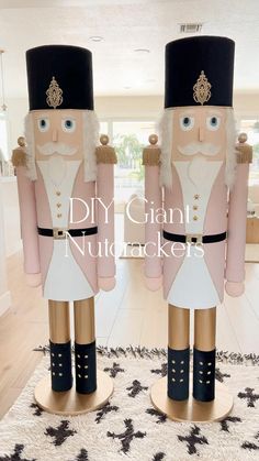 two large nutcrackers are standing in the middle of a living room area