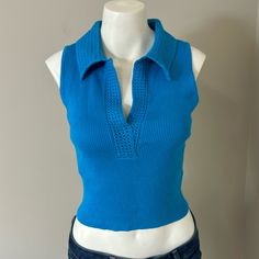 Caroline Constas Luxe Ribbed Knit Crop Tank Can Be Casual With Jeans Or Dressed Up With A Maxi Skirt. Beautiful Crochet Trim. Size: Medium Color: Vibrant Blue New With Tags. No Flaws. Details: - Stretch Fabric - Sleeveless Design - V-Neck With Crochet Collar - Machine Washable Contents: 70% Rayon, 30% Nylon Fast Shipping - Ships Same Day Or Next Day!! Thanks For Supporting My Small Business! Blue Stretch Knit Top, Fitted Knit Sweater Vest In Blue, Fitted Blue Knit Sweater Vest, Blue Fitted V-neck Knit Top, Blue Fitted Sweater Vest For Spring, Fitted Blue V-neck Knit Top, Trendy Fitted Blue Sweater Vest, Casual Blue Knitted Top, Fitted Blue Sweater Vest For Spring