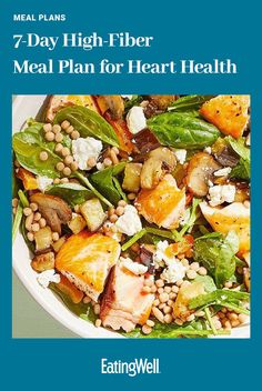 a white bowl filled with vegetables and meat