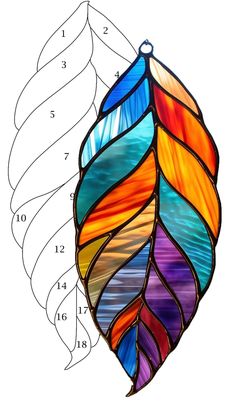 a stained glass leaf is shown with numbers on the bottom and bottom half of it