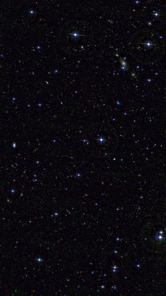 an image of the night sky with many stars and bright lights on it's surface