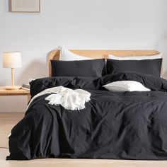 PRICES MAY VARY. Material: 100% washed cotton, slightly wrinkled look, great linen feel. If you want a linen style bedding, this duvet cover set is beautiful and perfect! The fabric is so soft yet with a very light crispness to it, even after washing, and it will get softer with each wash. It's like sleeping in a cloud. Simple classic solid deep black, working with any bedding. Duvet cover reverses to same. Pillowcase ends with envelop closure. Cal King Size Duvet Cover Set (3 pcs) includes: 1 D Black Comfy Bedding, Queen Size Duvet Covers, Green Duvet, Comfortable Chic, Green Duvet Covers, Lightweight Bedding, King Size Duvet Covers, Home Bedding, Coverlet Set