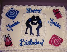 a birthday cake with an image of two people holding each other