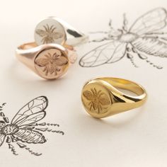 Gorgeous and unique handmade, officially hallmarked sterling silver or gold full seal honey bee signet rings.  These lovely unique rings are available in hallmarked sterling silver, 18ct yellow gold vermeil, 18ct rose gold vermeil, 9ct yellow, rose and white gold. Please allow approximately 1 extra week if ordering solid gold. We are happy to gift wrap your jewellery free of charge and send directly to your gift recipient. Each piece of jewellery is tastefully presented in our signature boxes, s Black Tissue Paper, Signet Ring Men, Signet Rings, Jewellery Designer, Lovely Ring, Jewellery Design, Yellow Rose, Honey Bee, Signet Ring