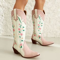 Pink Floral Cowboy Boots Step into style with our elegant Pink Floral Cowboy Boots. These boots are not only fashionable, but also durable and perfect for any occasion. Whether you're out on the ranch or hitting the town, these boots will make a statement. Embrace your inner cowgirl with a touch of floral elegance.