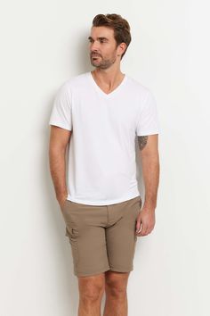 Meet the only tee you need, ever. Vince, our classic v-neck tee with an elevated feel. The Vince V-Neck Travel Shirt is designed with a nod to your favorite lived-in tee. The comfortable relaxed fit and flattering v-neckline add a wear-anywhere feel to this must-have men's travel tee. Crafted using Anatomie's signature wrinkle-free fabrics, this relaxed v-neck men's t-shirt is perfect for wearing on its own or for layering with your other favorite pieces when heading out for a day of sightseeing Travel Vest, Curvy Pants, Panel Leggings, Travel Tees, Travel Shirt, Mens Travel, Men Tshirt, Safari Jacket, Travel Shirts